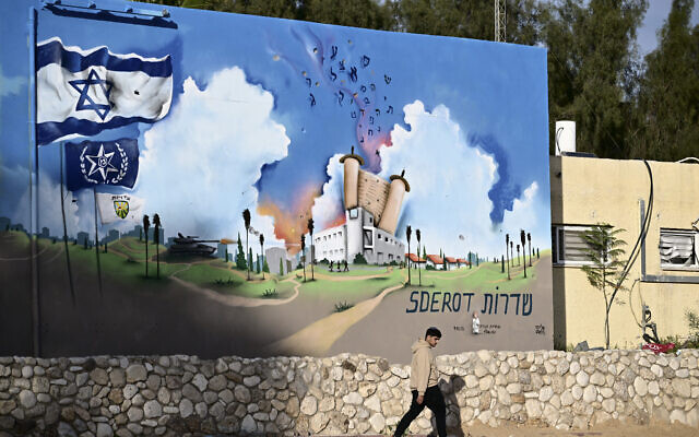 A man walks past the Sderot police station that was attacked by Hamas terrorists on October 7, in the southern Israeli city of Sderot near the Gaza border on January 8, 2024, during ongoing battles between Israel and the Hamas. (Alberto PIZZOLI/AFP) A man walks past the Sderot police station that was attacked by Hamas terrorists on October 7, in the southern Israeli city of Sderot near the Gaza border on January 8, 2024, during ongoing battles between Israel and the Hamas. (Alberto PIZZOLI/AFP)
