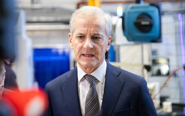 Norwegian Prime Minister Jonas Gahr Store speaks to the media during a visit to the weapons manufacturer Nammo, in Raufoss, Norway on January 17, 2024. (Petter Berntsen/AFP)