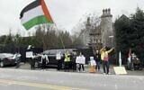 A small group of protesters demonstrate outside the home of US Secretary of State Antony Blinken, Arlington, Virginia, January 28, 2024 (Roberto Schmidt/AFPTV/AFP)