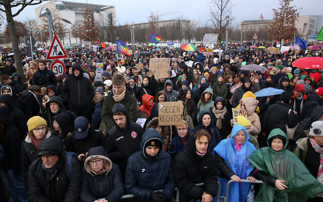 Demonstrators protest against the far-right Alternative for Germany (AfD) party outside the Reichstag building in Berlin, Germany on February 3, 2024. (Adam Berry/AFP) Demonstrators protest against the far-right Alternative for Germany (AfD) party outside the Reichstag building in Berlin, Germany on February 3, 2024. (Adam Berry/AFP)