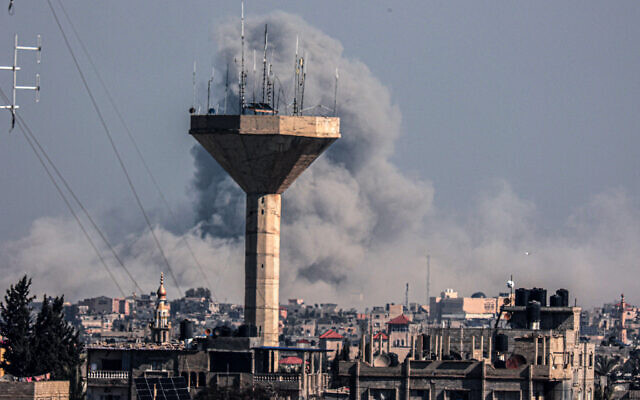A picture taken from Rafah in the southern Gaza Strip shows smoke rising over buildings in Khan Younis following Israeli bombardment on February 5, 2024, as fighting continues between Israel and the Hamas terror group. (SAID KHATIB / AFP) A picture taken from Rafah in the southern Gaza Strip shows smoke rising over buildings in Khan Younis following Israeli bombardment on February 5, 2024, as fighting continues between Israel and the Hamas terror group. (SAID KHATIB / AFP)