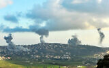 Smoke billows over the southern Lebanese border village of El-Khiam during Israeli bombardment on February 7, 2024. (Rabie DAHER / AFP)