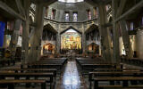 This picture taken on January 31, 2024 shows a view of the almost empty Roman Catholic Basilica of the Annunciation in Nazareth in northern Israel. Nazareth's landmark basilica is empty, the surrounding restaurants, stores and market that thrive on pilgrims are closed, while hotels in the Old City have been shut for months. (Nicolas Garcia/AFP)