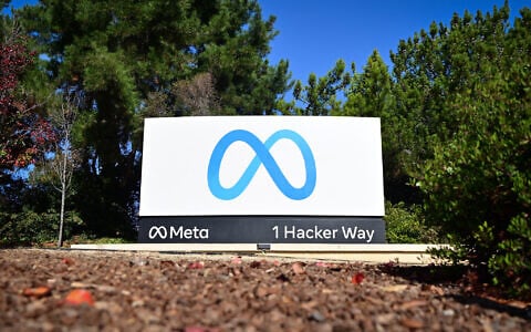The Meta (formerly Facebook) logo marks the entrance of corporate headquarters in Menlo Park, California, on November 9, 2022. (Josh Edelson/AFP)