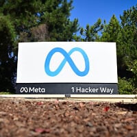 The Meta (formerly Facebook) logo marks the entrance of corporate headquarters in Menlo Park, California, on November 9, 2022. (Josh Edelson/AFP)