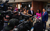 Mazi Melesa Pilip (2nd from R), US Republican Congressional candidate for New York's 3rd district, speaks with reporters after voting early at a polling station in Massapequa, New York, on February 9, 2024. (Photo by Adam Gray / POOL / AFP)