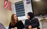 Rawda Elbatrawish (R) and Liora Pelavin speak during an interview at Teaneck High School in Teaneck, New Jersey, on January 19, 2024. (KENA BETANCUR / AFP)