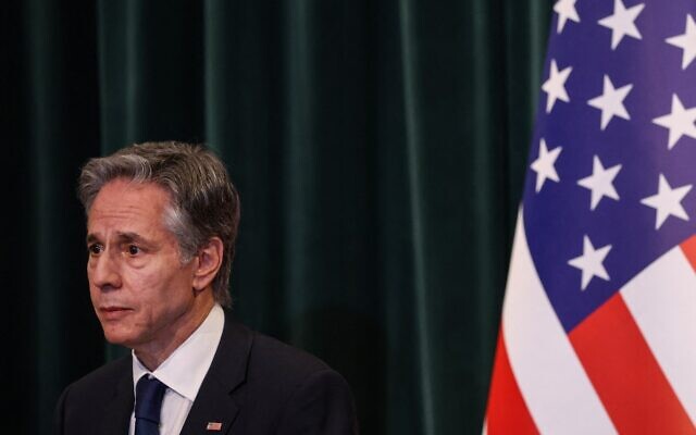 US Secretary of State Antony Blinken looks on next to an American flag during a press conference with Albania's prime minister in Tirana on February 15, 2024. (Adnan Beci/AFP) US Secretary of State Antony Blinken looks on next to an American flag during a press conference with Albania's prime minister in Tirana on February 15, 2024. (Adnan Beci/AFP)