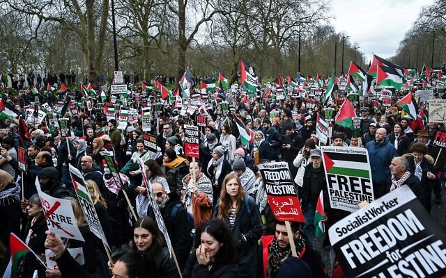 Pro-Palestinian activists and supporters wave flags and carry placards during a protest against Israel in central London on February 17, 2024. (Justin Tallis/AFP) Pro-Palestinian activists and supporters wave flags and carry placards during a protest against Israel in central London on February 17, 2024. (Justin Tallis/AFP)