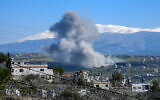 Smoke billows from the site of an Israeli airstrike on the southern Lebanese village of Khiam near the border with Israel on February 21, 2024. (Rabih DAHER / AFP)