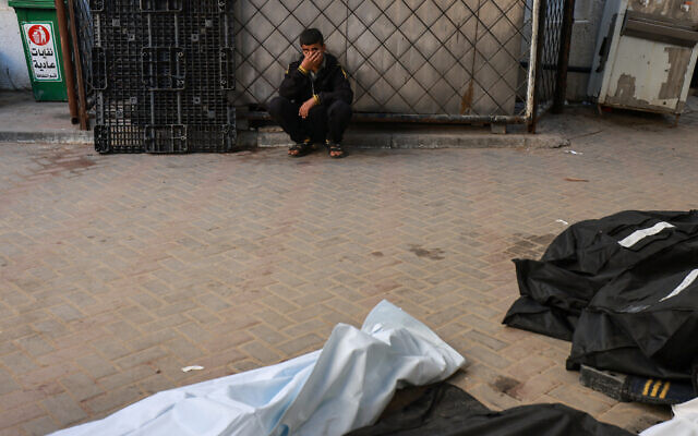 A Palestinian boy reacts near bodies lying at Al Najar hospital in Rafah in the southern Gaza Strip on February 22, 2024 following overnight Israeli air strikes. (Mohammed Abed/AFP) A Palestinian boy reacts near bodies lying at Al Najar hospital in Rafah in the southern Gaza Strip on February 22, 2024 following overnight Israeli air strikes. (Mohammed Abed/AFP)