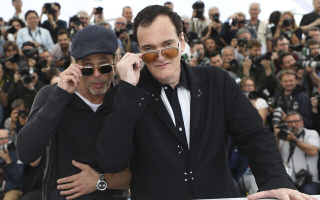 Actor Brad Pitt, left, and director Quentin Tarantino pose for photographers at the photo call for the film 'Once Upon a Time in Hollywood' at the 72nd international film festival, Cannes, southern France, Wednesday, May 22, 2019. (Vianney Le Caer/Invision/AP) Actor Brad Pitt, left, and director Quentin Tarantino pose for photographers at the photo call for the film 'Once Upon a Time in Hollywood' at the 72nd international film festival, Cannes, southern France, Wednesday, May 22, 2019. (Vianney Le Caer/Invision/AP)