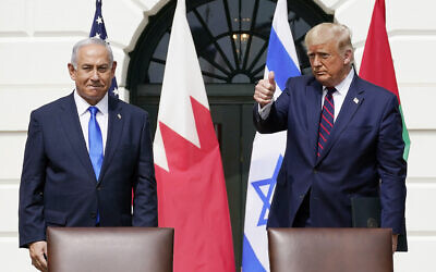 Then-US president Donald Trump and Prime Minister Benjamin Netanyahu attend the Abraham Accords signing ceremony on the South Lawn of the White House in Washington, September 15, 2020. (AP Photo/ Alex Brandon, File)