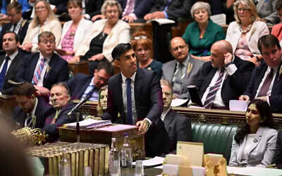 In this handout photo provided by UK Parliament, Britain's Prime Minister Rishi Sunak speaks during Prime Minister's Questions in the House of Commons in London, Wednesday, September 13, 2023. (Maria Unger/UK Parliament via AP)