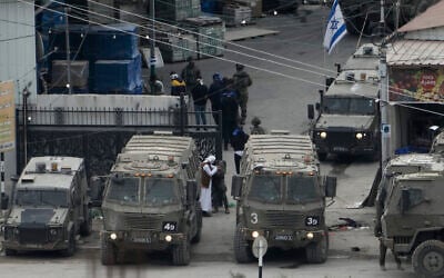 Illustrative: Israeli security forces operating in Nur Shams refugee camp near Tulkarem in the West Bank on January 3, 2024. (Majdi Mohammed/AP)