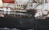 This photograph provided by the Indian Navy shows US-owned ship Genco Picardy which came under attack from a bomb-carrying drone launched by Yemen's Houthi rebels in the Gulf of Aden, January 18, 2024. (Indian Navy via AP)