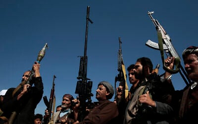 Houthi fighters stage a rally in support of the Palestinians in the Gaza Strip and against the US-led airstrikes on Yemen, in Sanaa, Yemen, January 29, 2024. (AP Photo/Osamah Abdulrahman)