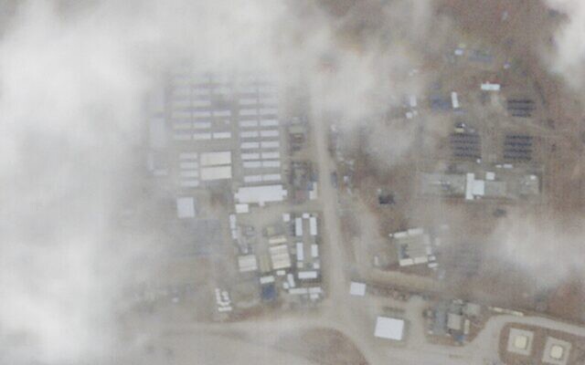 A satellite photo from Planet Labs PBC shows a military base known as Tower 22 in northeastern Jordan on Monday, Jan. 29, 2024. The damage caused by the drone strike can be seen in the center-left of the photo. (Planet Labs PBC via AP) A satellite photo from Planet Labs PBC shows a military base known as Tower 22 in northeastern Jordan on Monday, Jan. 29, 2024. The damage caused by the drone strike can be seen in the center-left of the photo. (Planet Labs PBC via AP)