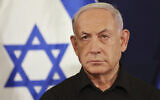 FILE - Israeli Prime Minister Benjamin Netanyahu attends a press conference with Defense Minister Yoav Gallant and Cabinet Minister Benny Gantz in the Kirya military base in Tel Aviv, Israel, October 28, 2023. (Abir Sultan/Pool Photo via AP, File)