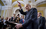 Senate Majority Leader Chuck Schumer, D-N.Y., answers questions on the border security talks as he meets reporters following a Democratic caucus meeting, at the Capitol in Washington, Wednesday, Jan. 31, 2024. (AP/J. Scott Applewhite)