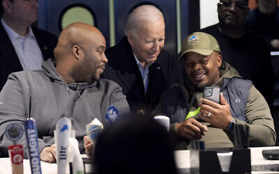 President Joe Biden, center, speaks with patrons at They Say restaurant during a campaign stop Thursday, Feb. 1, 2024, in Harper Woods, Michigan. (AP/Evan Vucci)