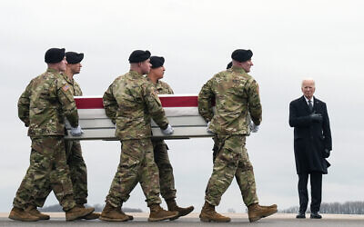 US President Joe Biden, right, stands as an Army carry team moves the transfer case containing the remains of US Army Sgt. Kennedy Ladon Sanders, 24, of Waycross, Ga., at Dover Air Force Base, Del., Friday, Feb. 2, 2024. Sanders was killed in a drone attack in Jordan on Jan. 28. (AP/Matt Rourke) US President Joe Biden, right, stands as an Army carry team moves the transfer case containing the remains of US Army Sgt. Kennedy Ladon Sanders, 24, of Waycross, Ga., at Dover Air Force Base, Del., Friday, Feb. 2, 2024. Sanders was killed in a drone attack in Jordan on Jan. 28. (AP/Matt Rourke)