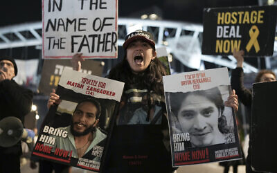 Israelis block a highway as they demand the release of the hostage from Hamas captivity during a rally in Tel Aviv, Israel, Sunday, Feb. 4, 2024. (AP Photo/Oded Balilty)