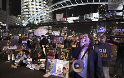 Israelis block a highway as they demand the release of the hostage from Hamas captivity during a rally in Tel Aviv, Israel, February 4, 2024. (AP Photo/Oded Balilty)