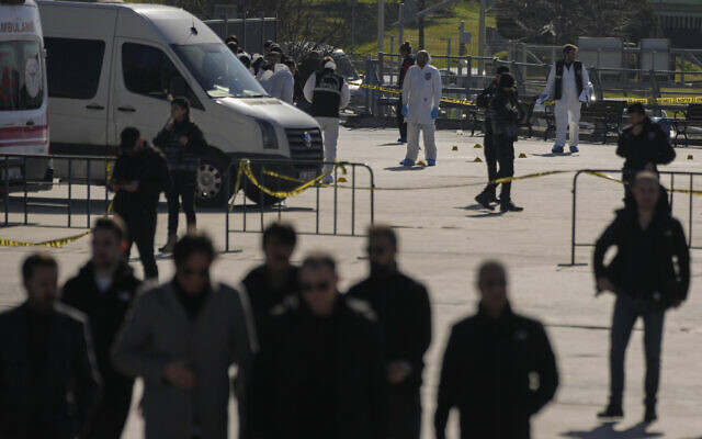 Security officers check the site where two attackers were killed outside a courthouse in Istanbul, Turkey, February 6, 2024. (AP Photo/Francisco Seco) Security officers check the site where two attackers were killed outside a courthouse in Istanbul, Turkey, February 6, 2024. (AP Photo/Francisco Seco)