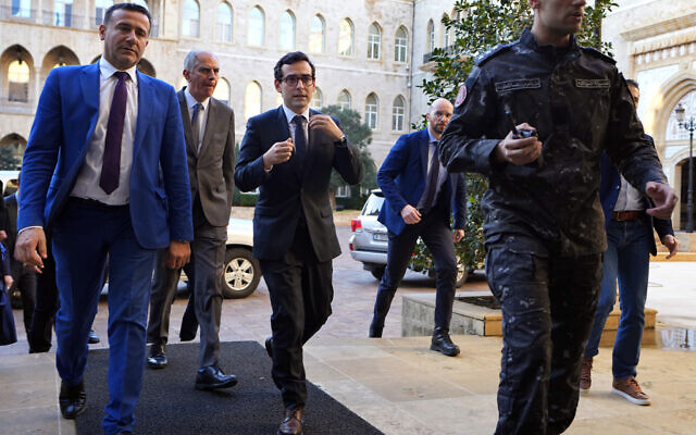 French Foreign Minister Stephane Sejourne, center, arrives to meet Lebanese caretaker Prime Minister Najib Mikati in Beirut, Lebanon, Tuesday, Feb. 6, 2024. Sejourne arrived in Beirut earlier in the day on an official visit to discuss the situation in the Middle East and tensions along the Lebanon-Israel border. (AP Photo/Bilal Hussein) French Foreign Minister Stephane Sejourne, center, arrives to meet Lebanese caretaker Prime Minister Najib Mikati in Beirut, Lebanon, Tuesday, Feb. 6, 2024. Sejourne arrived in Beirut earlier in the day on an official visit to discuss the situation in the Middle East and tensions along the Lebanon-Israel border. (AP Photo/Bilal Hussein)