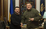 In this photo provided by the Ukrainian Presidential Press Office, Ukrainian President Volodymyr Zelensky, left, shake hand with Commander-in-Chief of Ukraine's Armed Forces Valerii Zaluzhnyi during their meeting in Kyiv, Ukraine, February 8, 2024. (Ukrainian Presidential Press Office via AP)