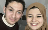 This undated image provided by Yasmeen Elagha shows Elagha, right, with her cousin Borak Alagha. Relatives of Borak Alagha, 28, and Hashem Alagha, 20, two American brothers trapped in Gaza, say Israeli forces have detained the two US citizens, along with their Canadian father, in a raid on their home early Thursday, Feb. 8, 2024. (Yasmeen Elagha via AP)