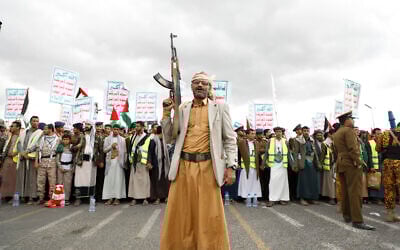 Illustrative: Houthi supporters attend a rally against the US-led airstrikes on Yemen and in support of the Palestinians in the Gaza Strip on Yemen, in Sanaa, Yemen, February 9, 2024. (AP Photo/Osamah Abdulrahman)