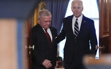 US President Joe Biden arrives with Jordan's King Abdullah II to speak in the Cross Hall of the White House, February 12, 2024, in Washington. (AP Photo/Andrew Harnik)