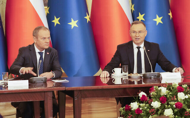 Poland's Prime Minister Donald Tusk, left, and President Andrzej Duda attend a meeting of the Cabinet Council, a consultation format between the president and the government, in Warsaw, Poland, on February 13, 2024. (AP Photo/Czarek Sokolowski) Poland's Prime Minister Donald Tusk, left, and President Andrzej Duda attend a meeting of the Cabinet Council, a consultation format between the president and the government, in Warsaw, Poland, on February 13, 2024. (AP Photo/Czarek Sokolowski)