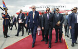 Turkey's President Recep Tayyip Erdogan, left, is welcomed by Egyptian President Abdel Fattah Al-Sissi prior their meeting in Cairo, Egypt, Feb. 14, 2024. (Turkish Presidency via AP)