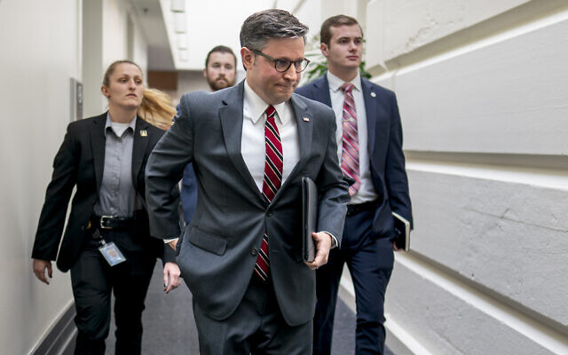 US House Speaker Mike Johnson of Louisiana arrives for a closed-door Republican caucus meeting, at the Capitol in Washington, February 14, 2024. (AP Photo/J. Scott Applewhite) US House Speaker Mike Johnson of Louisiana arrives for a closed-door Republican caucus meeting, at the Capitol in Washington, February 14, 2024. (AP Photo/J. Scott Applewhite)