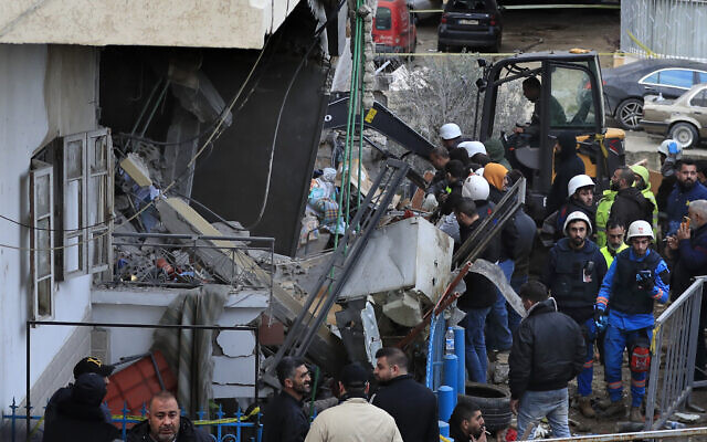 Civil defense and rescue workers remove rubbles from a building that was hit Wednesday night by an Israeli airstrike, in Nabatiyeh town, south Lebanon, Thursday, Feb. 15, 2024. (AP Photo/Mohammed Zaatari) Civil defense and rescue workers remove rubbles from a building that was hit Wednesday night by an Israeli airstrike, in Nabatiyeh town, south Lebanon, Thursday, Feb. 15, 2024. (AP Photo/Mohammed Zaatari)