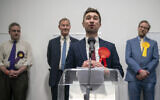 Labour candidate Damien Egan gives a speech after being declared MP for Kingswood, at the Thornbury Leisure Centre, Gloucestershire, Friday February 16, 2024. (Ben Birchall//PA via AP)
