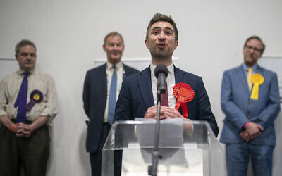Labour candidate Damien Egan gives a speech after being declared MP for Kingswood, at the Thornbury Leisure Centre, Gloucestershire, Friday February 16, 2024. (Ben Birchall//PA via AP)