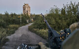 FILE - A Ukrainian soldier sits in his position in Avdiivka, Donetsk region, Ukraine, on Aug. 18, 2023 (AP Photo/Libkos, File)