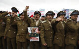 Illustrative: Houthi supporters attend a rally against US-led strikes against Yemen and in the support of Palestinians in the Gaza Strip, in Sanaa, Yemen, Friday, February 16, 2024. Iranian general Qassem Soleimani, who was killed in an American airstrike in 2020, is in the photo. (AP Photo/Osamah Abdulrahman)
