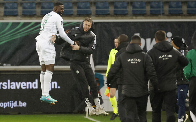 Maccabi Haifa's Frantzdy Pierrot, left, celebrates after scoring his side's opening goal during the Europa Conference League play off second leg soccer match between Gent and Maccabi Haifa at the KAA Gent Arena in Ghent, Belgium, Wednesday, Feb. 21, 2024. (AP Photo/Geert Vanden Wijngaert) Maccabi Haifa's Frantzdy Pierrot, left, celebrates after scoring his side's opening goal during the Europa Conference League play off second leg soccer match between Gent and Maccabi Haifa at the KAA Gent Arena in Ghent, Belgium, Wednesday, Feb. 21, 2024. (AP Photo/Geert Vanden Wijngaert)