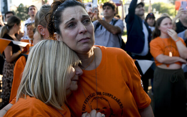 Sandra Miasnik, right, an aunt of Argentine-Israeli infant Kfir Bibas, a hostage of Hamas in Gaza, attends a gathering one day before his first birthday in Buenos Aires, Argentina, Jan. 17, 2024. (Gustavo Garello/AP) Sandra Miasnik, right, an aunt of Argentine-Israeli infant Kfir Bibas, a hostage of Hamas in Gaza, attends a gathering one day before his first birthday in Buenos Aires, Argentina, Jan. 17, 2024. (Gustavo Garello/AP)