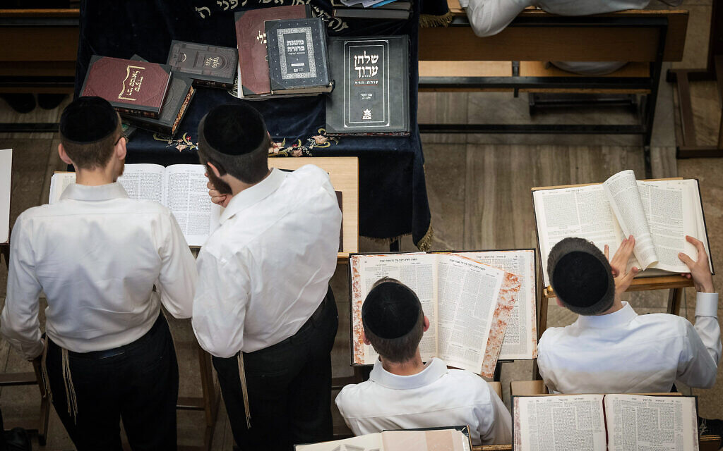Ultra-Orthodox men study at the Kamenitz Yeshiva, in Jerusalem, on August 22, 2023. (Chaim Goldberg/Flash90) Ultra-Orthodox men study at the Kamenitz Yeshiva, in Jerusalem, on August 22, 2023. (Chaim Goldberg/Flash90)