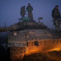 Israeli reservists are seen after a military drill in the Golan Heights, northern Israel, January 24, 2024. (Michael Giladi/Flash90)