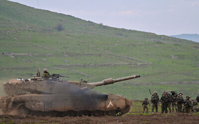 Israeli reserve soldiers from the Nachal brigade take part in a military drill in the Golan Heights, northern Israel, February 13, 2024. (Michael Giladi/Flash90)