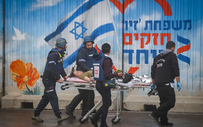 Injured Israelis are brought to Ziv Medical Center in Safed after a Hezbollah rocket attack on February 14, 2024. (David Cohen/Flash90)