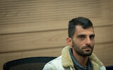 Extremist settler Yinon Levi attends a Knesset Economic Committee meeting after he was sanctioned by the US government, in Jerusalem, February 14, 2024. (Yonatan Sindel/Flash90)