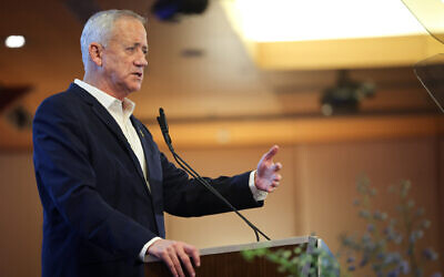 Minister Benny Gantz speaks at a gathering of the Conference of Presidents of Major American Jewish Organizations in Jerusalem, February 18, 2024. (Yonatan Sindel/Flash90)